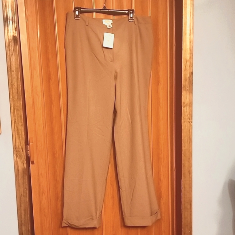 Brand new trousers with cuffed legs.